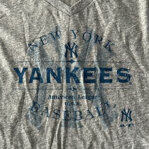 Yankees women’s v neck t-shirt grey. Never worn bought at yankee stadium NWT